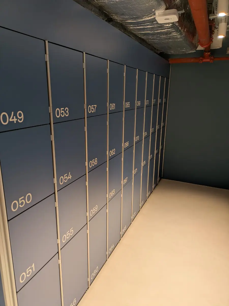Numbered blue locker bank at Otherwander Soho